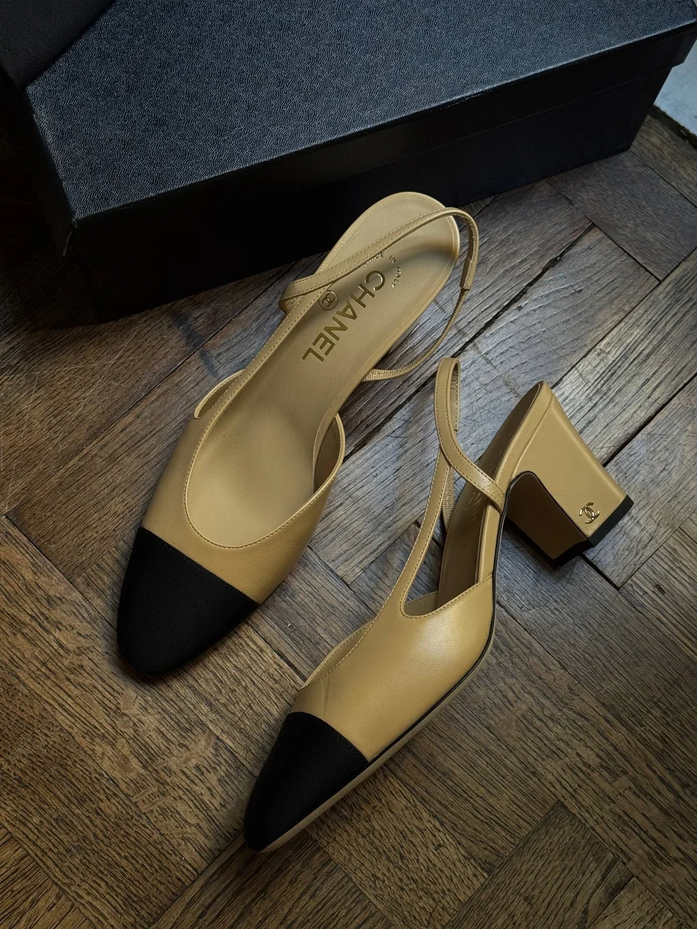 CHANEL Beige Slingback Pumps with Black Cap Toe